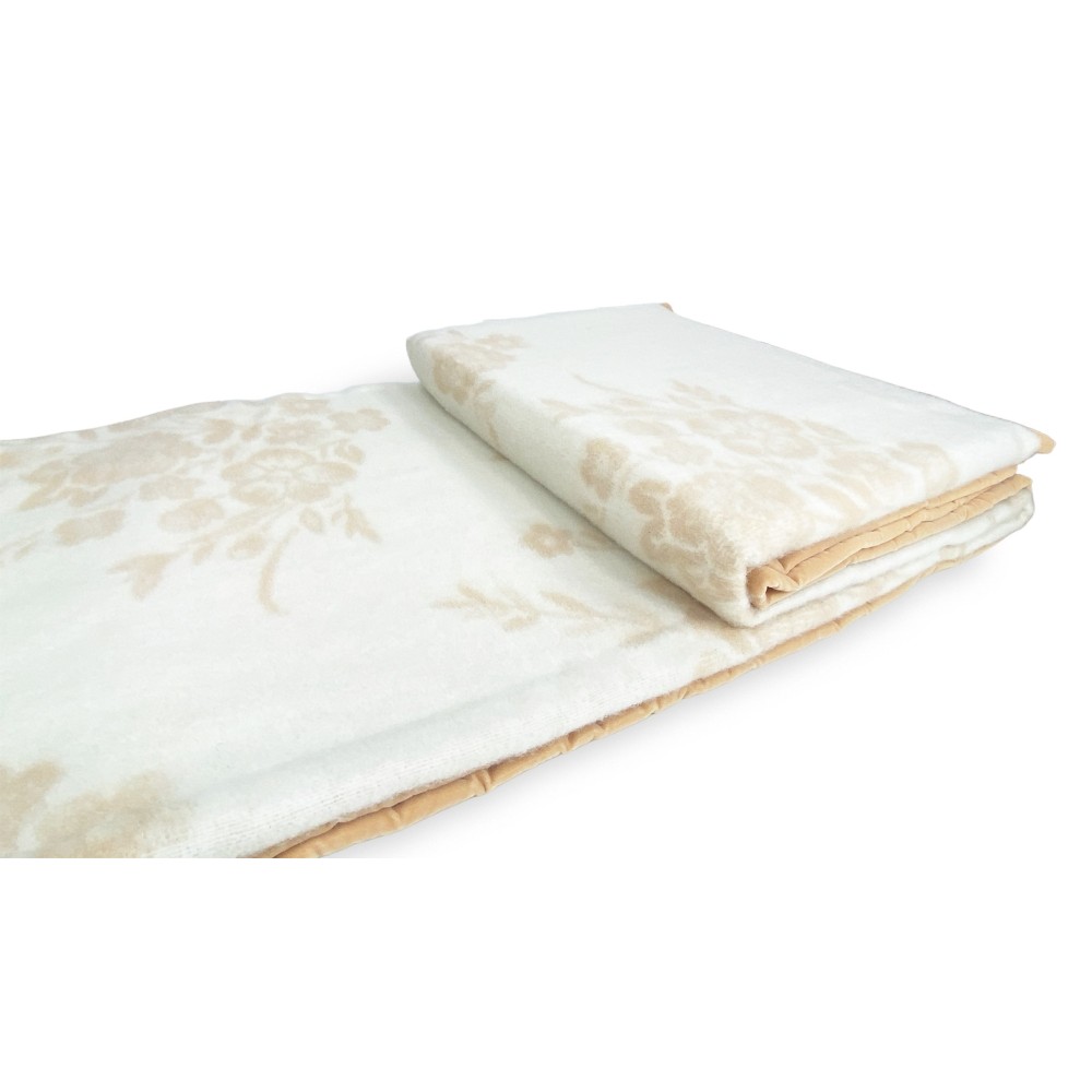 Coperta in pura lana vergine in un bel disegno classico sul beige
