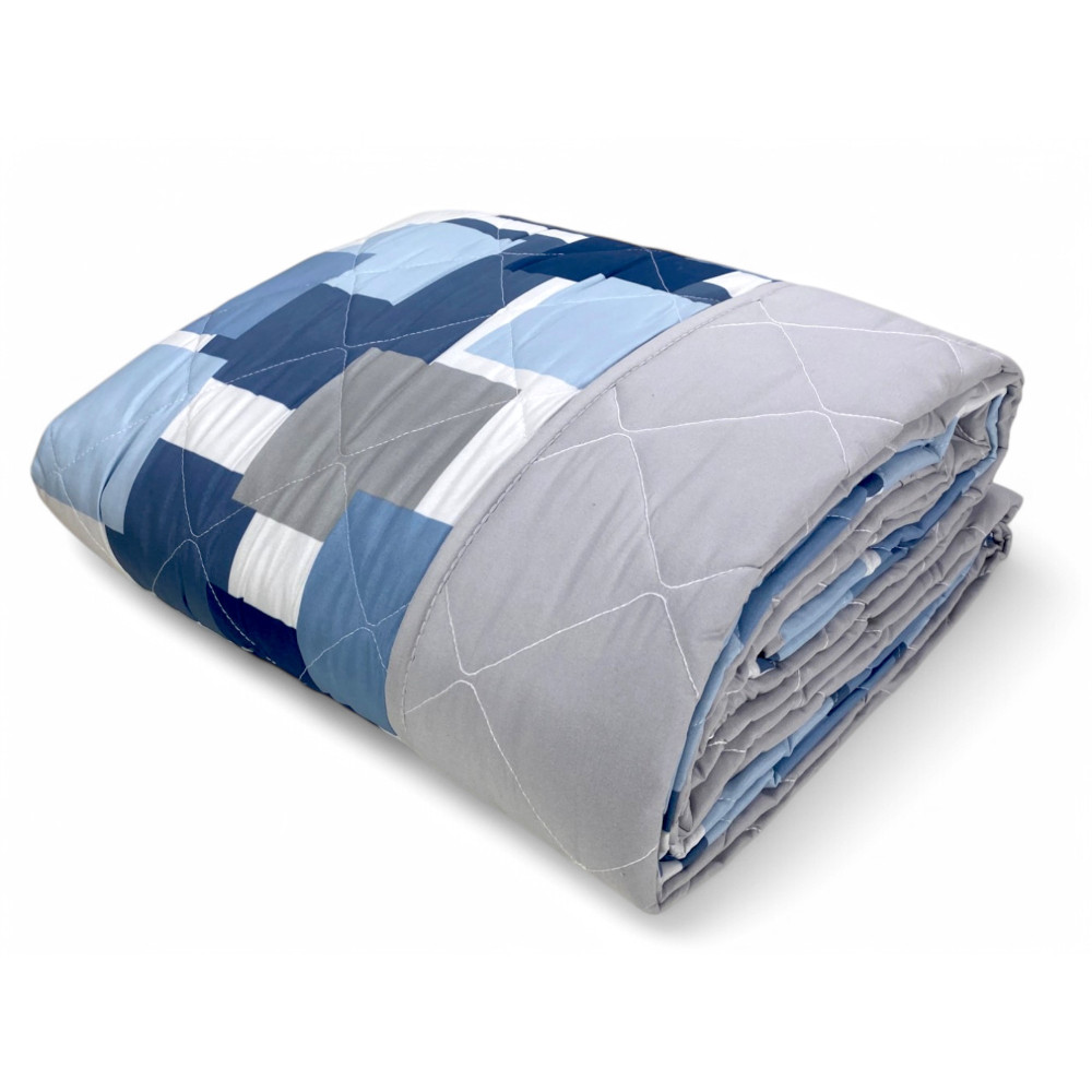 Colcha acolchada de cuadros azules – Diseño geométrico moderno con cuadros en varios tonos de azul y gris