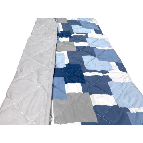 Dos uni gris clair du couvre-lit, assorti au motif géométrique