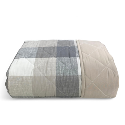 Détail en tissu de couvre-lit matelassé - motif tartan classique avec coutures en losange