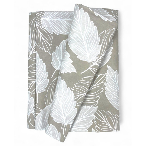 Housse de feuille beige utilisée comme housse de canapé