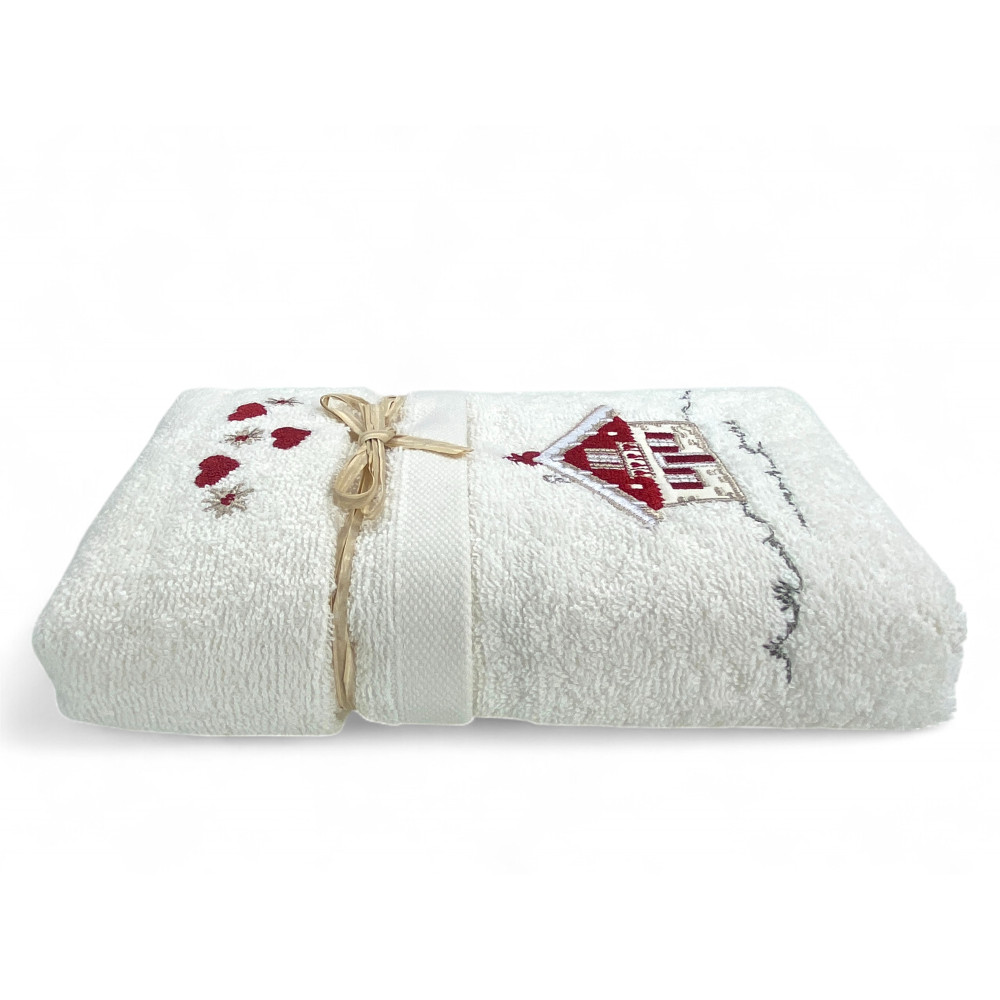 Tyrolean bath set in cream terry cloth with embroidered chalet-themed details