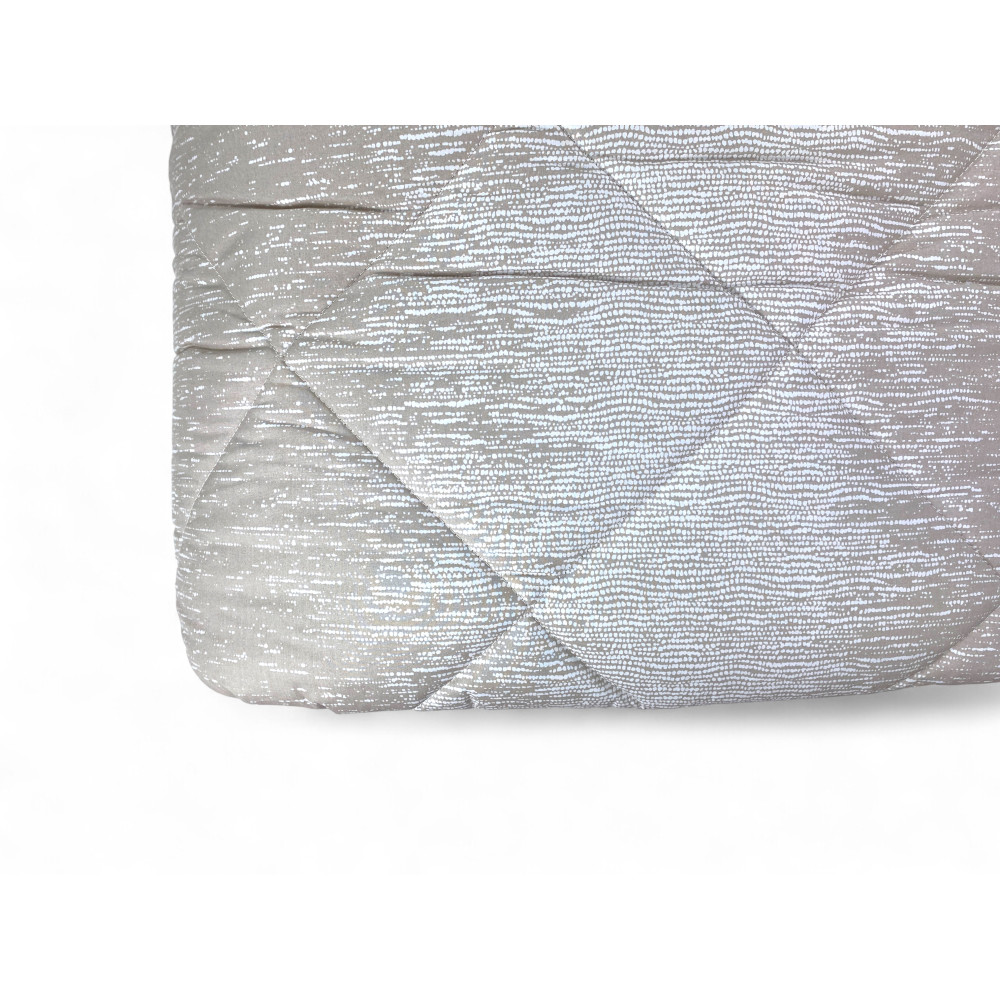 Trapunta Kot Bollicine Beige - Dettaglio trapuntatura a bollicine per un design raffinato.