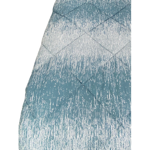 Colcha Kot Teal Bubbles - Detalle de acolchado de burbujas para un diseño refinado.