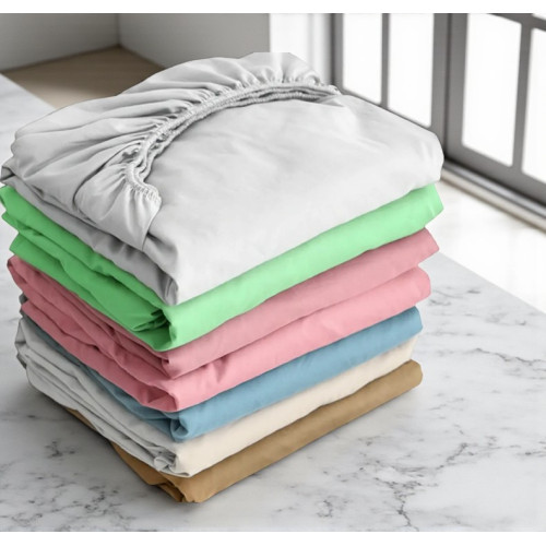 Sábana bajera azul jersey sobre colchón doble ortopédico alto