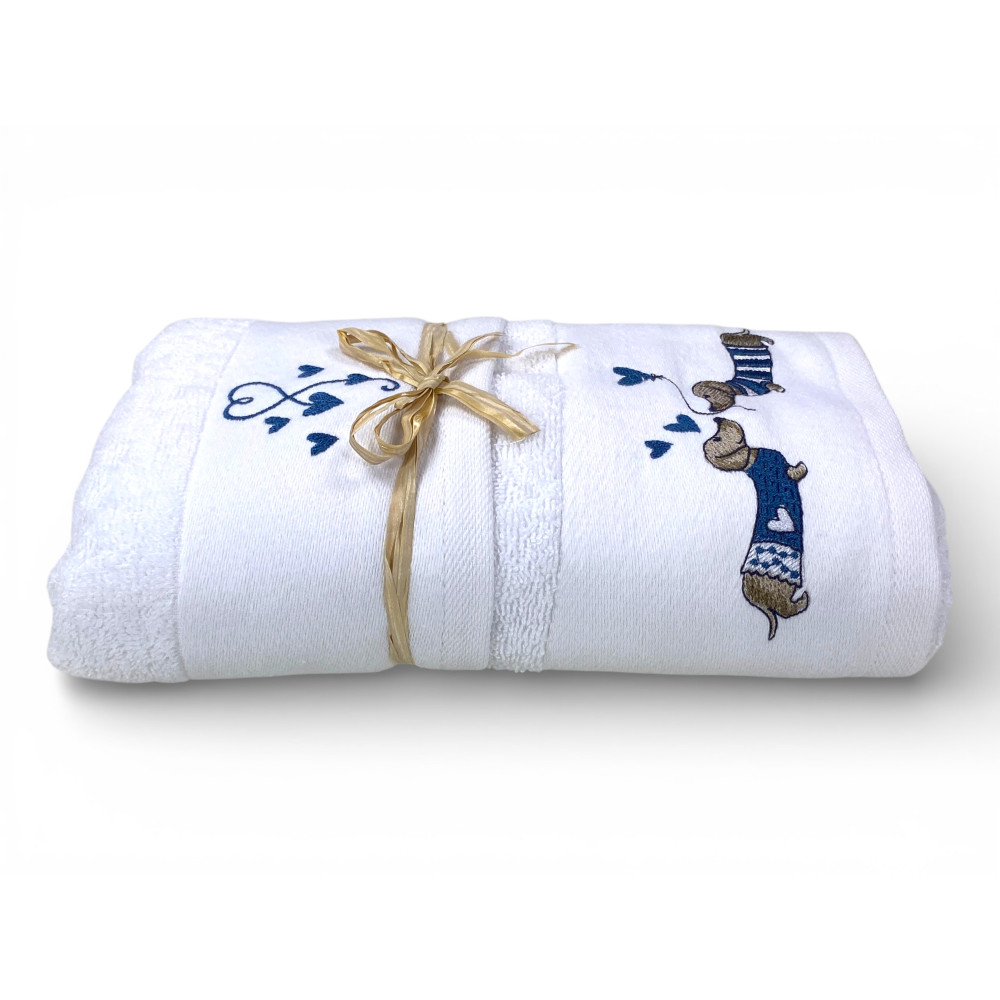 Dachshund embroidery detail with blue striped sweater and hearts on towels