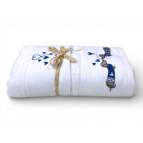 Dachshund embroidery detail with blue striped sweater and hearts on towels