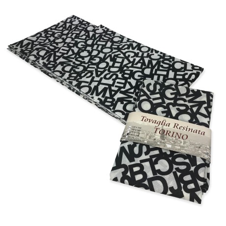 MANTEL RESINADO RESISTENTE A LAS MANCHAS TORINO LETTERE BLANCO NEGRO